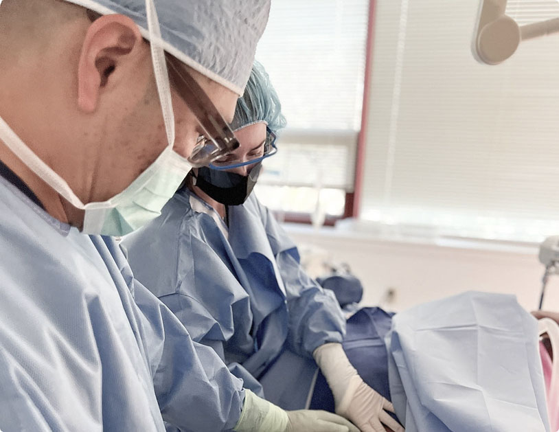 Dr. Kwak performing liposuction